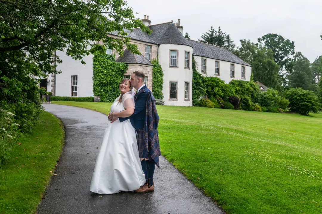 Bride and Groom alone in front of Logie Country House, Aberdeen