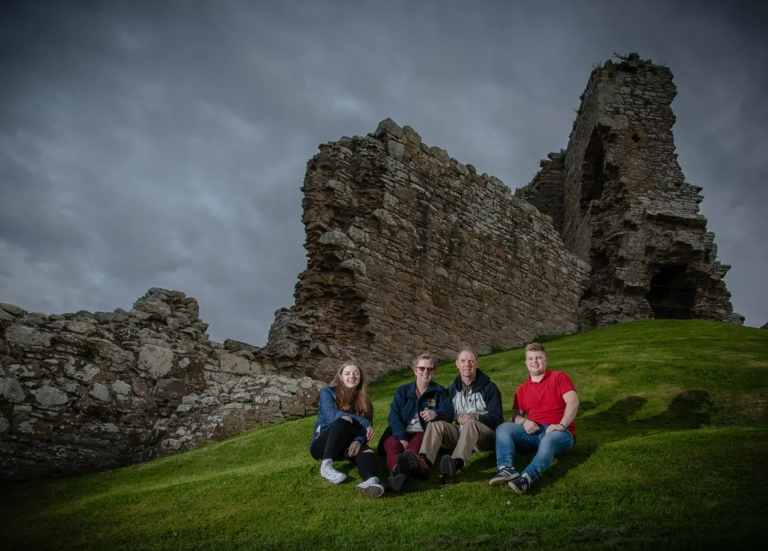 Family at the ruins of a castle