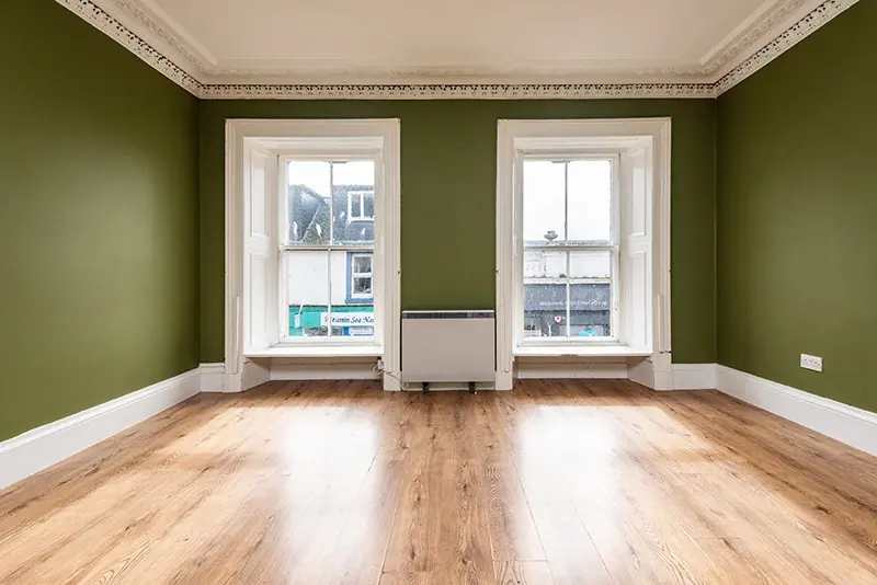 Empty room with sash windows