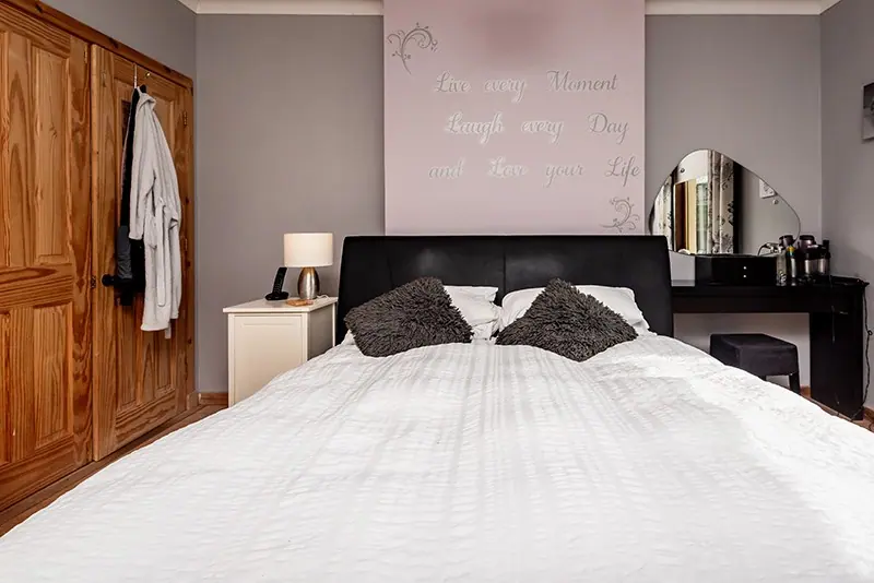 Bedroom with feature wall