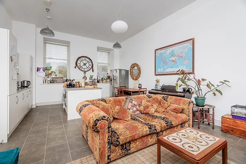 Open-plan lounge with patterned sofa