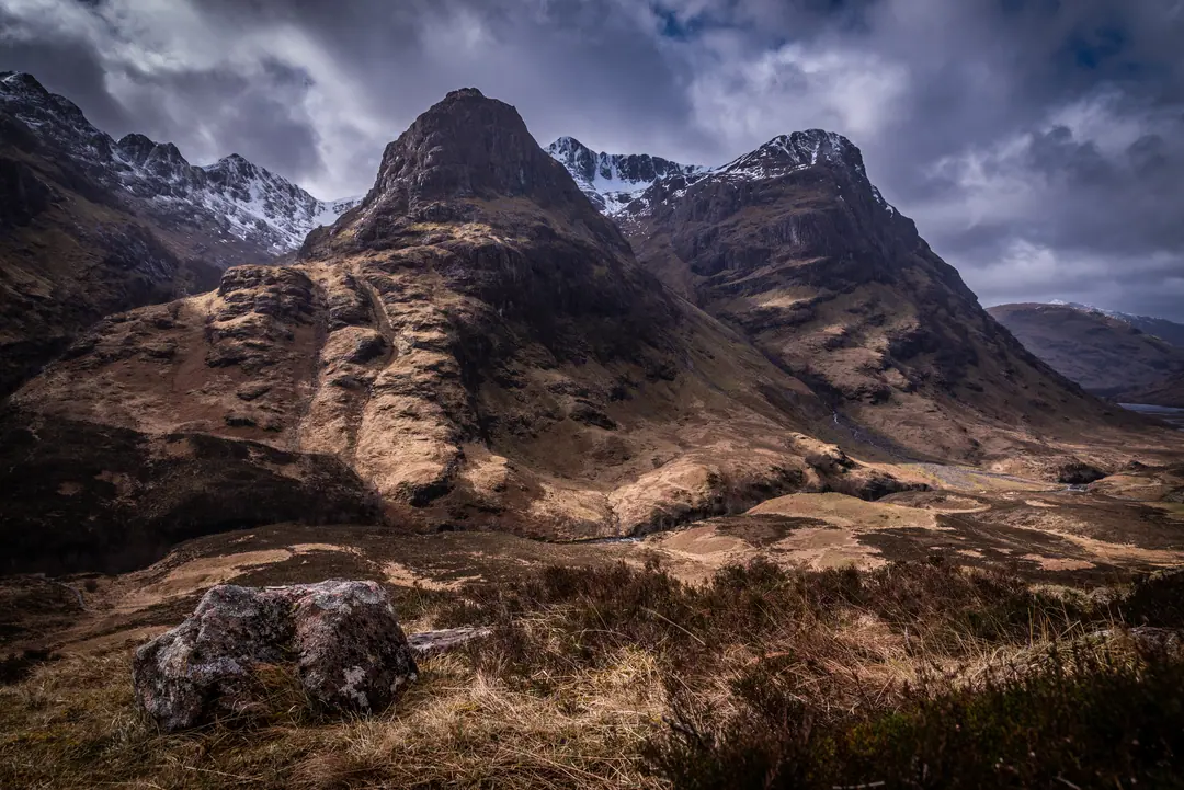 The Three Sisters of Glencoe under a winter sky