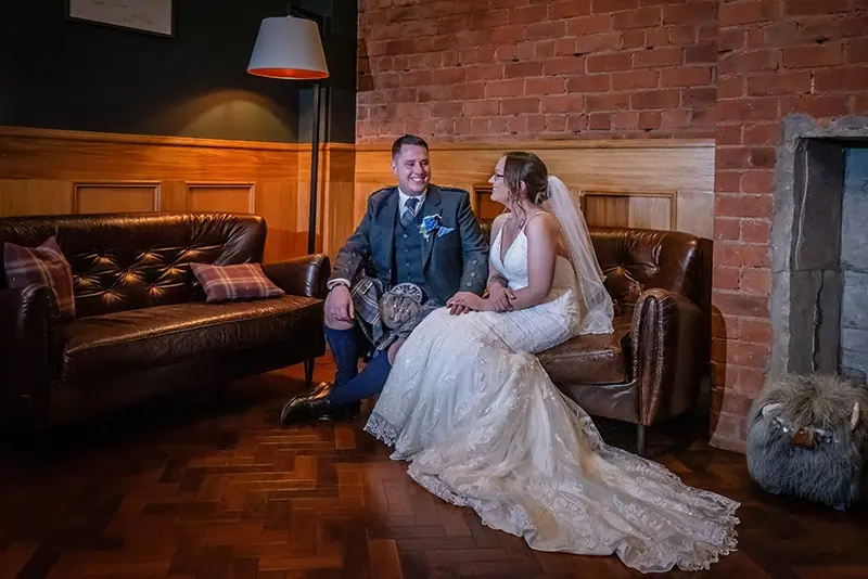 Couple in a wood-panelled bar